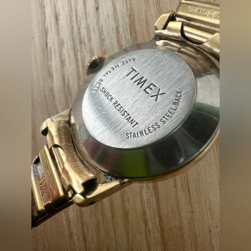 Vintage Timex ladies round gold tone mechanical winding watch